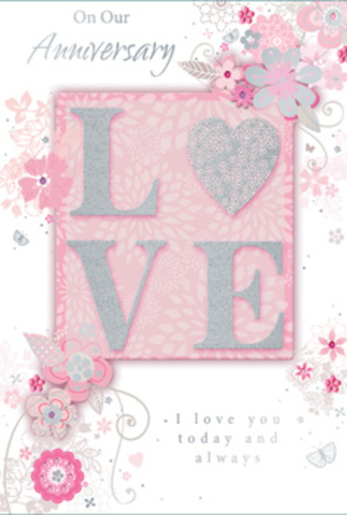 The anniversary card in this image carries the same tenderness as a hand-delivered bouquet arriving at a Richmond doorstep on a calm evening. Its central feature is the word LOVE, prominently placed and formed in slightly raised letters coated with a fine layer of glitter. This gentle sparkle plays across the surface like sunlight on pale rose petals, giving the design a tactile charm that makes you imagine running your fingers lightly over each letter. The background is a soft harmony of blush pinks, luminous whites, and quiet silver accents, blending in smooth gradients that recall the inside of a delicate flower. Around the central word, an illustrated arrangement of flowers and curling leaves spreads gracefully, as though a florist had translated a bouquet into line and shade. The flowers are stylised yet expressive, drawn with careful, flowing strokes that suggest real petals, stems, and tendrils. They unfurl in clusters along the edges and corners, creating a frame that feels simultaneously natural and thoughtfully composed. Tiny hints of silver-foil detailing glimmer here and there, adding highlights like droplets of water on a fresh arrangement from a Richmond high street shop. Nestled among this floral artwork is a loving anniversary message, set in a refined, script-style typeface that winds gently across the page. The letters curl and loop in a way that feels intimate and personal, turning printed words into something almost handwritten. The whole card suggests a serene celebration of enduring love-an object you can imagine placed beside a vase of blush and ivory blooms on a table with views towards the river, quietly marking years of shared memories and future hopes.
